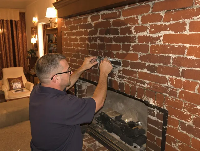 Montclair Chimney Sweep expert fixing a fireplace in Montclair, CA